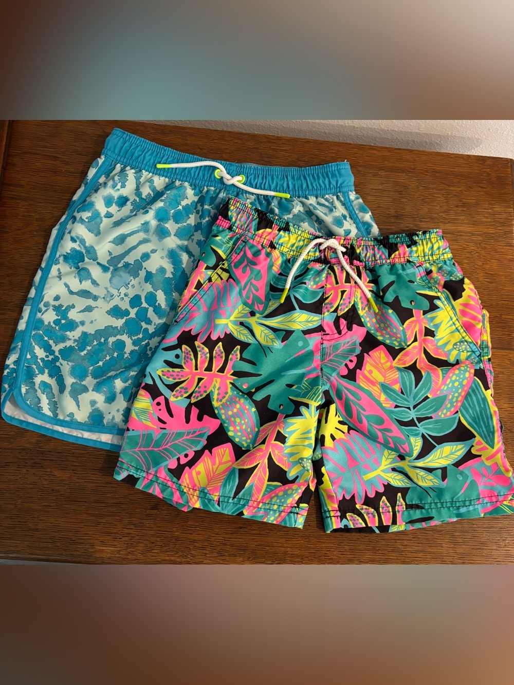 2 PAIRS OF BOYS SWIM TRUNKS